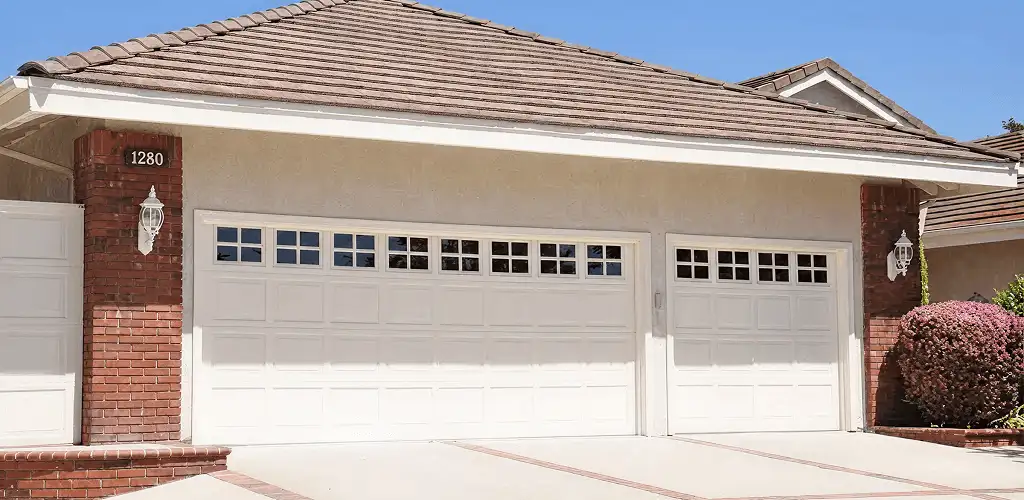 Residential garage door repair service for a double garage door in Richmond, VA