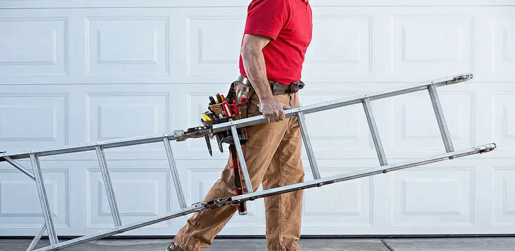 Garage door repair technician arriving with tools and ladder in Richmond, VA
