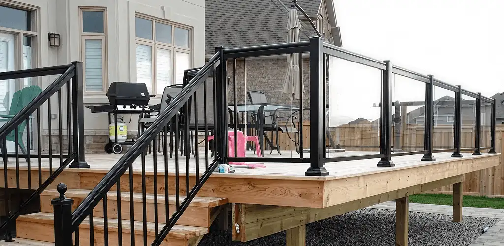 Handrail installation on a deck staircase for safety and code compliance in Richmond, VA